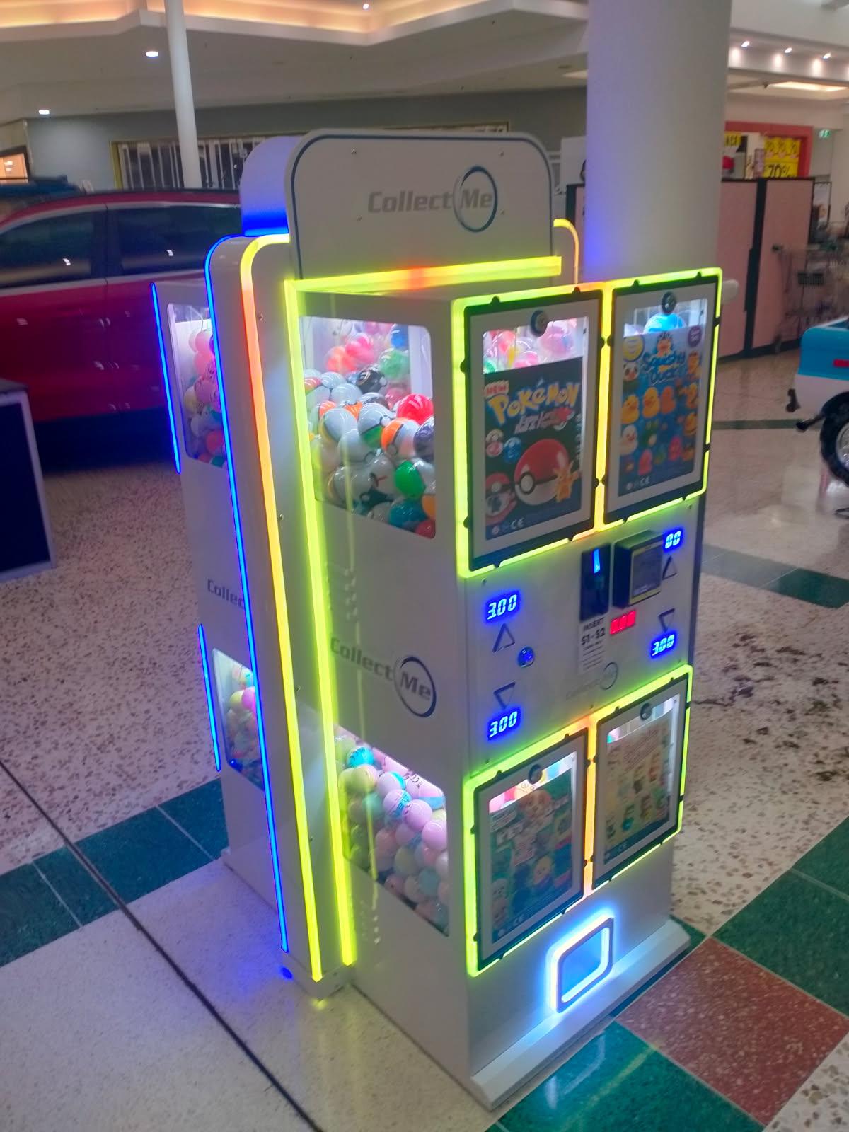 TVM capsule vending machine installed near a car park entrance in a shopping centre